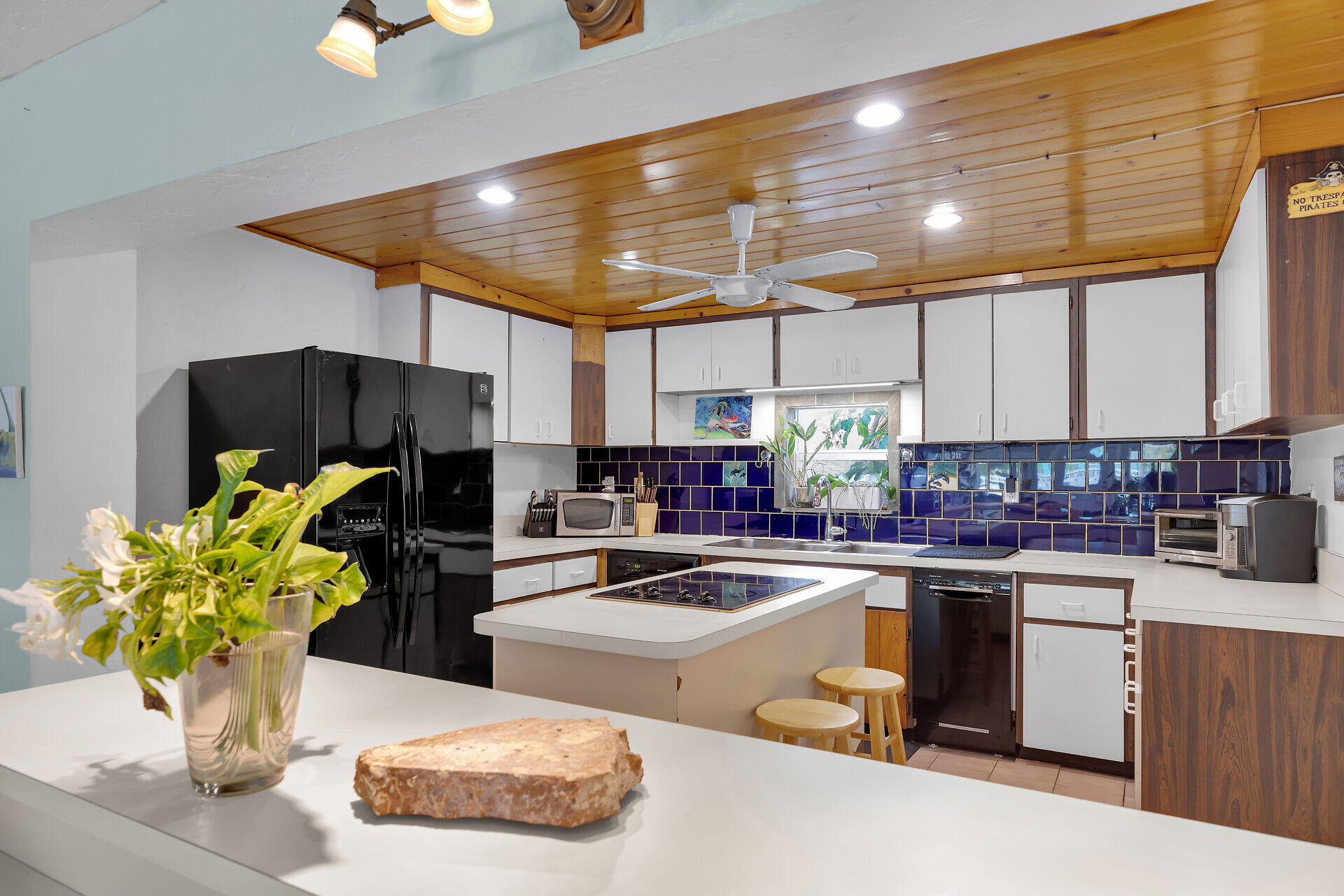 16 Janet Place Key Largo, FL 33037 - Photo 16 of 29 a kitchen with a sink a counter and appliances