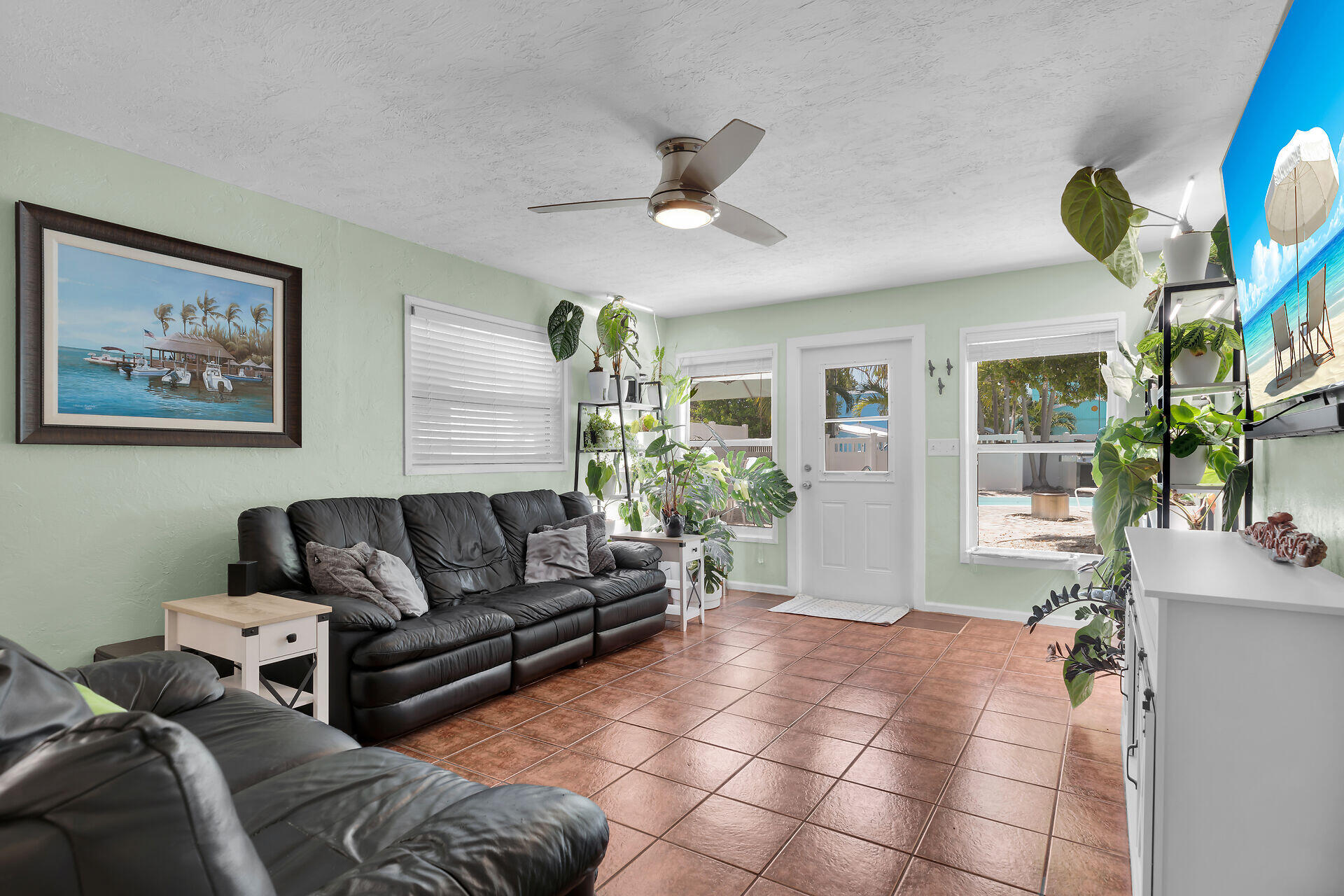 16 Janet Place Key Largo, FL 33037 - Photo 9 of 29 a living room with furniture and a large window