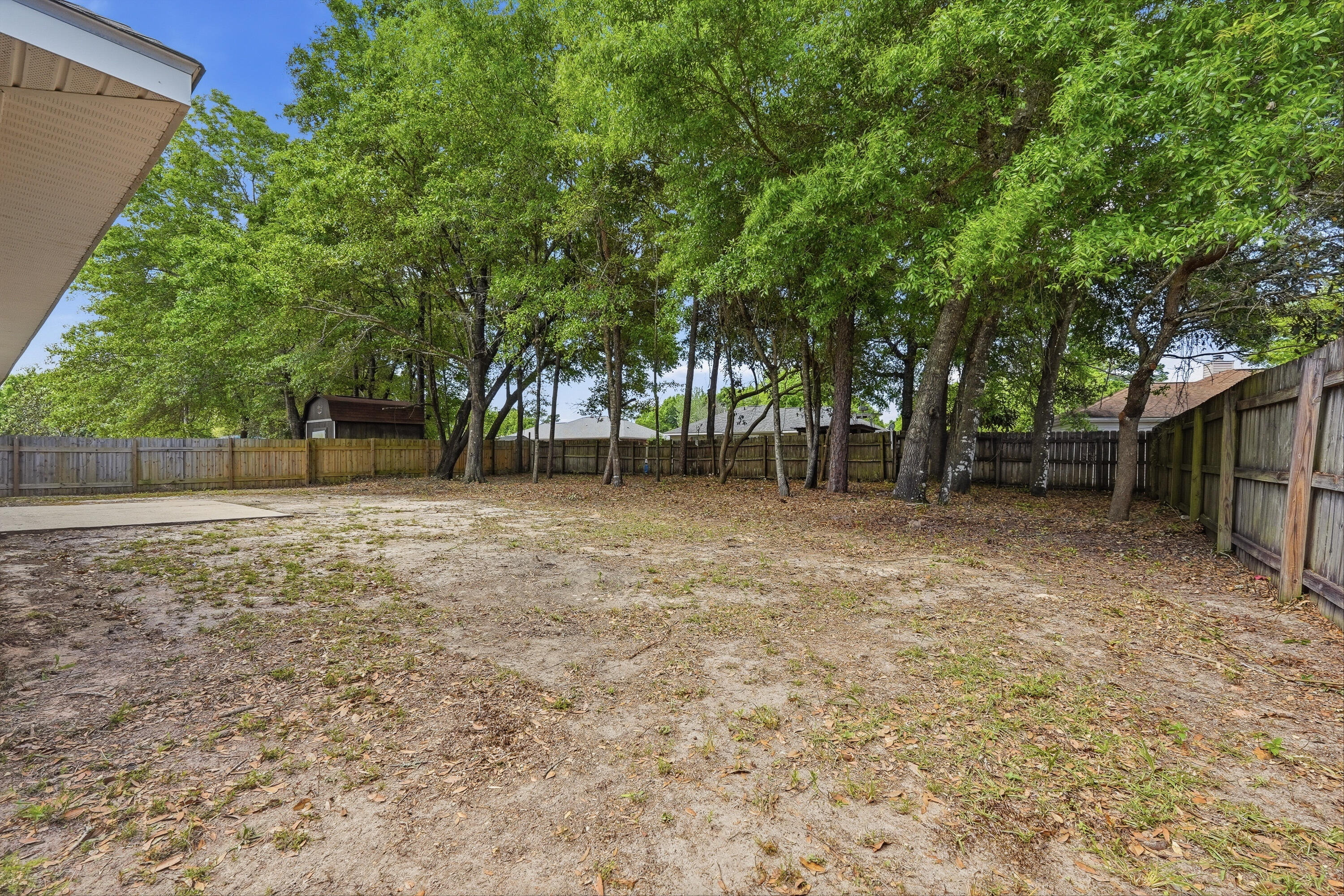 4087 Audiss Road Milton, FL 32583 - Photo 30 of 34 a backyard of a house
