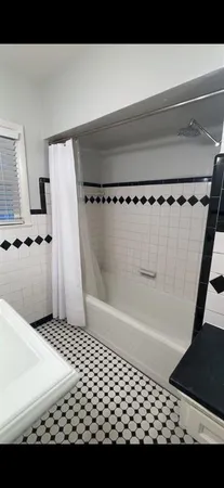 a bathroom with a sink a toilet and vanity