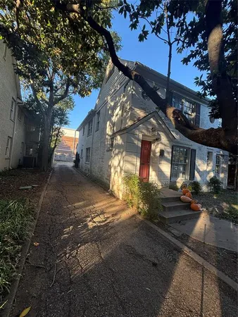 a view of a street with cars