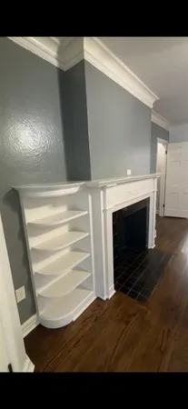 a kitchen with kitchen island a stove a sink and a refrigerator