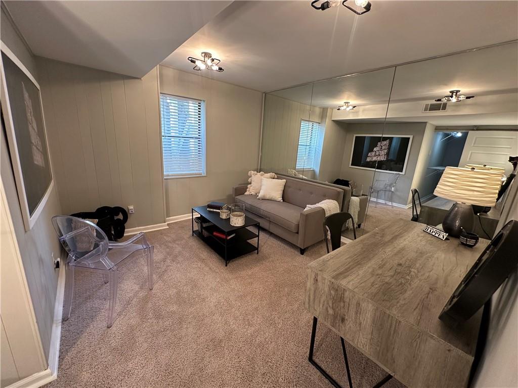 3823 Paces Ferry West Atlanta, GA 30339 - Photo 29 of 33 a bedroom with furniture and a mirror