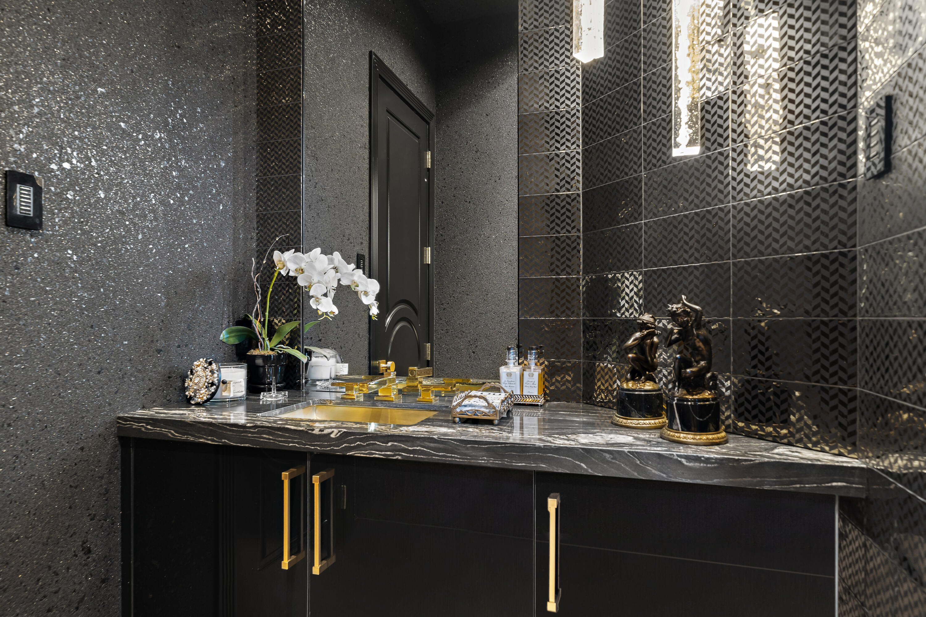 40440 Morningstar Road Rancho Mirage, CA 92270 - Photo 17 of 64 a bathroom with a sink and a mirror