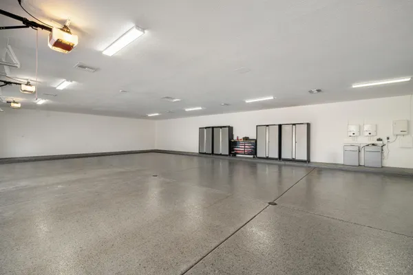 a bathroom with a mirror and a shower