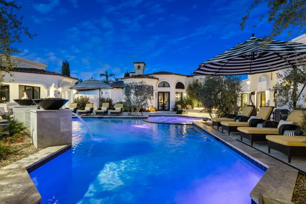 an aerial view of a house with a garden and plants