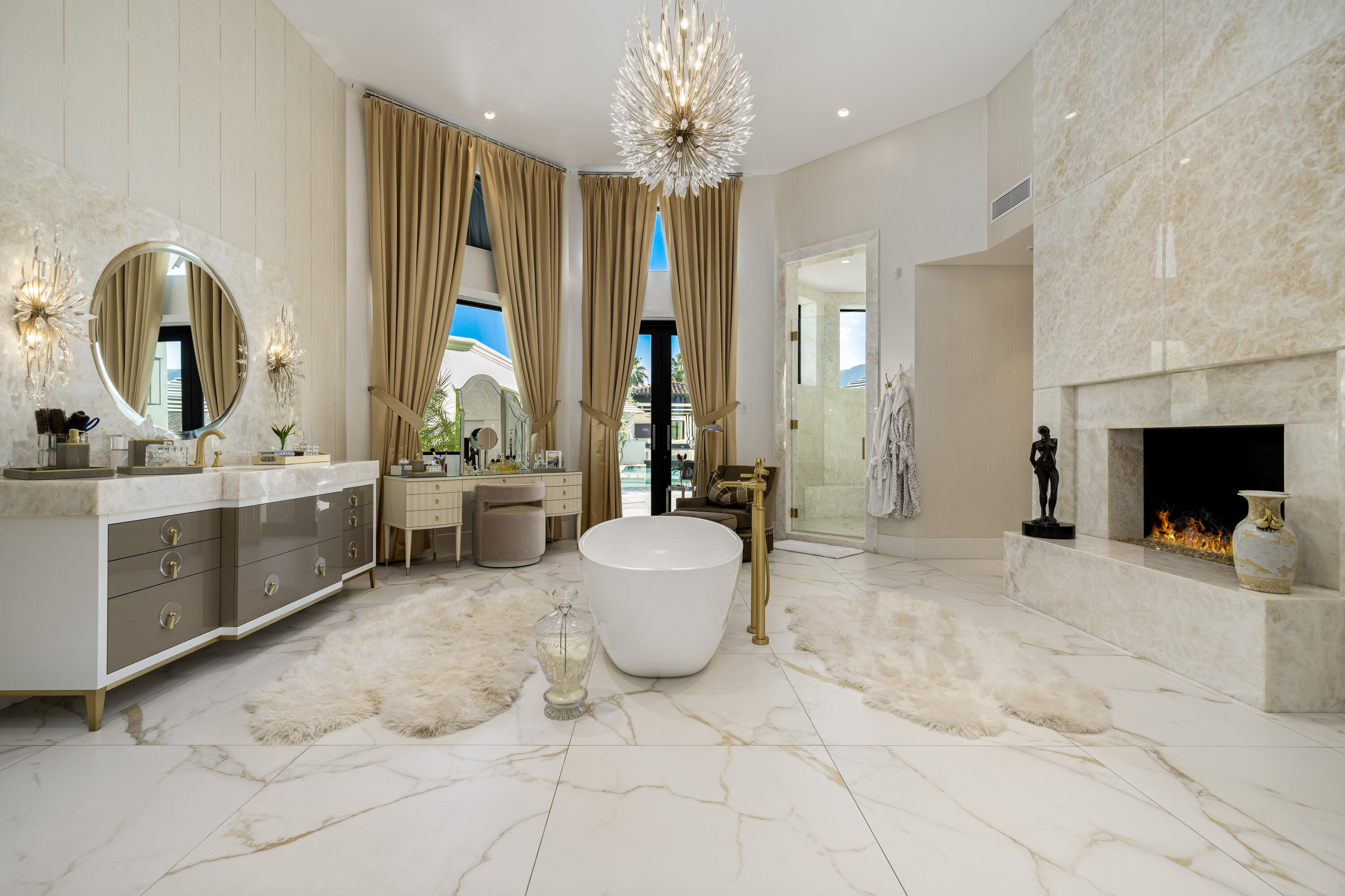 40440 Morningstar Road Rancho Mirage, CA 92270 - Photo 28 of 64 a living room with furniture and a fireplace