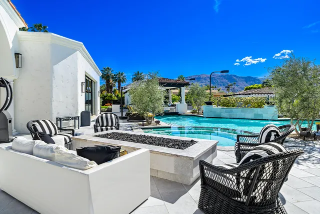a bathroom with a shower curtain and a window