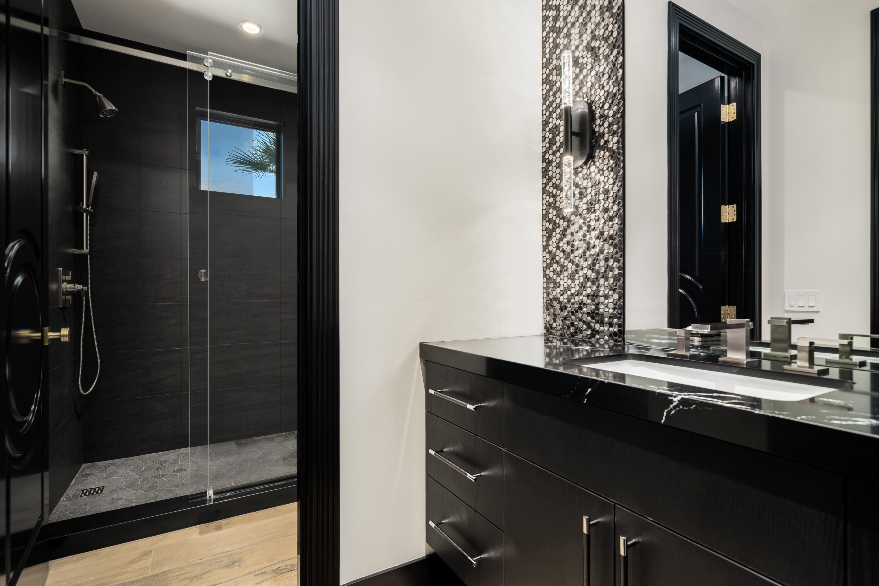 40440 Morningstar Road Rancho Mirage, CA 92270 - Photo 51 of 64 a bathroom with a mirror and a shower