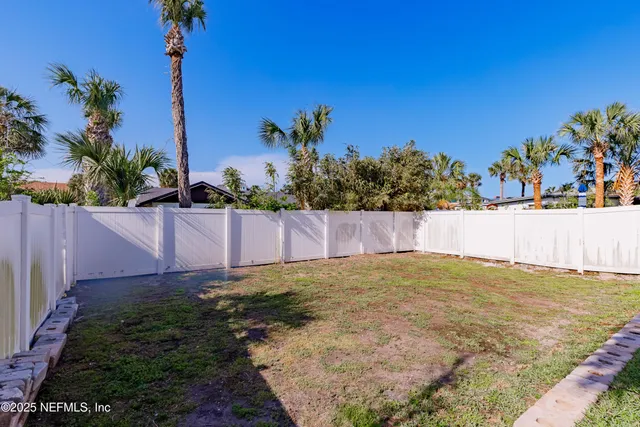 a view of an outdoor space and a yard