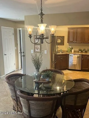 a room with table and chairs