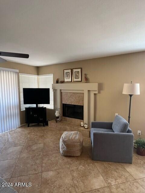 8700 East Mountain View Road, Unit 1058 Scottsdale, AZ 85258 - Photo 4 of 31 a living room with furniture and a flat screen tv