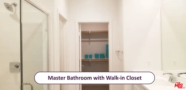 a bathroom with a toilet and a sink