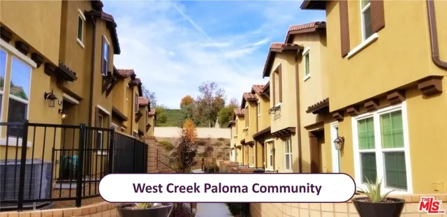 a view of outdoor space with a table and chairs