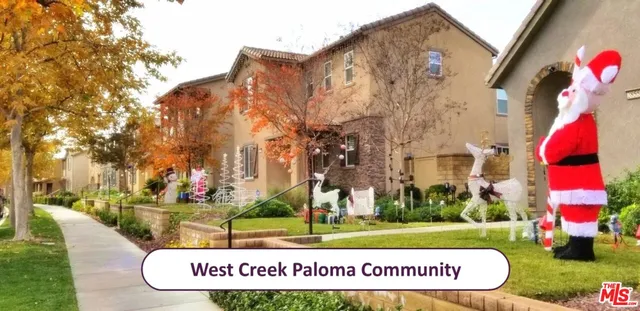 a view of outdoor sitting space with furniture