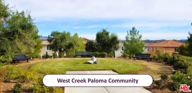 a view of outdoor space with signage and flags