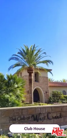 a view of a wooden floor with a mountain in the background
