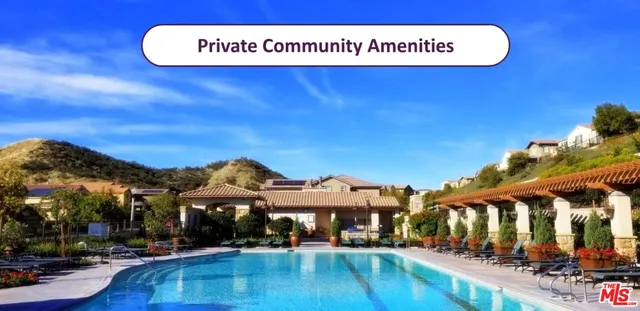 a view of a kitchen with dining room and wooden floor