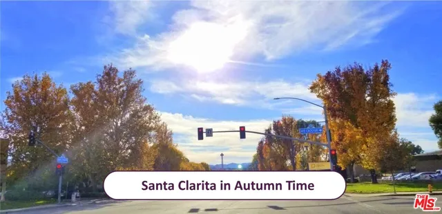 a kitchen with a refrigerator and a stove