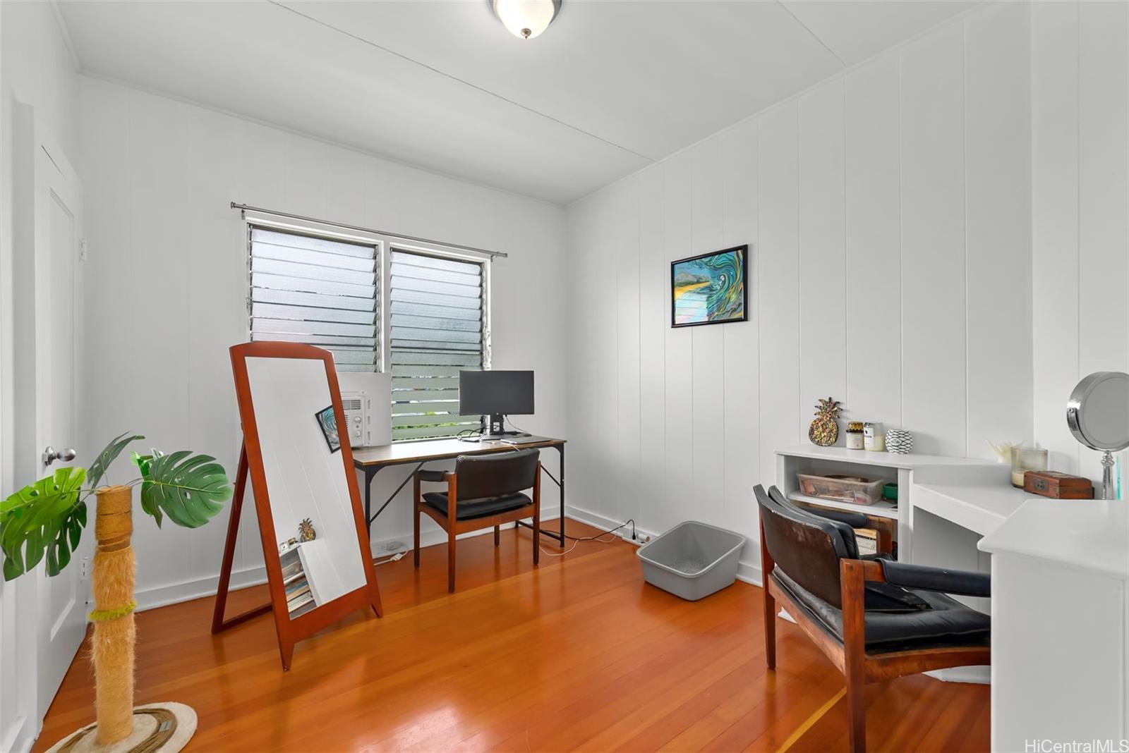 2811 Henry Street Honolulu, HI 96817 - Photo 12 of 25 Work from home in paradise! This bright, peaceful room currently serves as an inspiring office space with wonderful natural light.