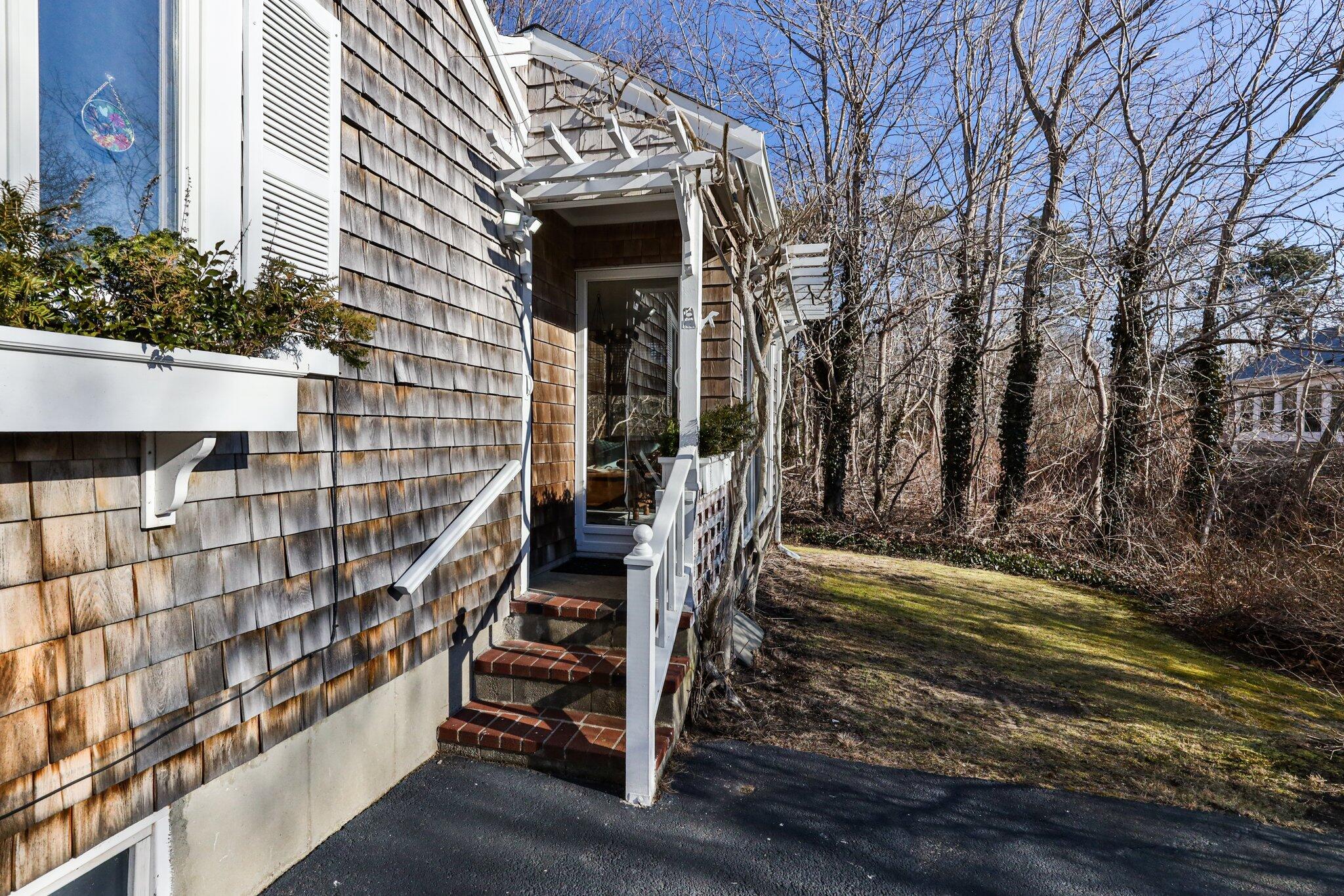 83 Doane Road Harwich Port, MA 02646 - Photo 4 of 48 Side entrance