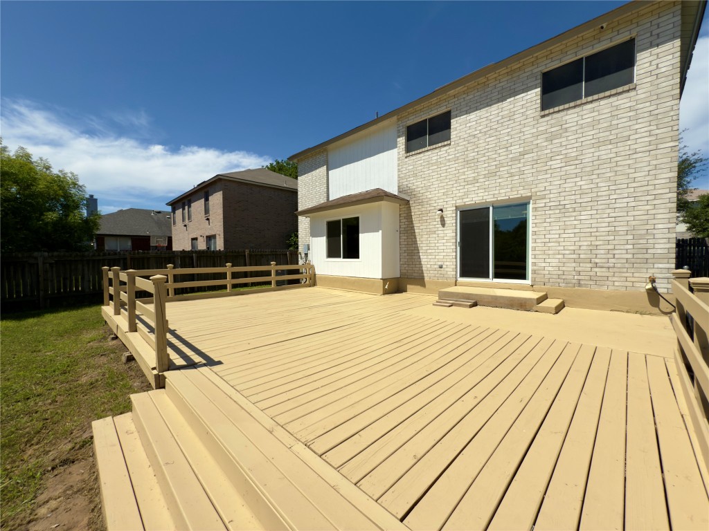7817 Marble Ridge Drive Austin, TX 78747 - Photo 37 of 38 Deck featuring a fenced backyard