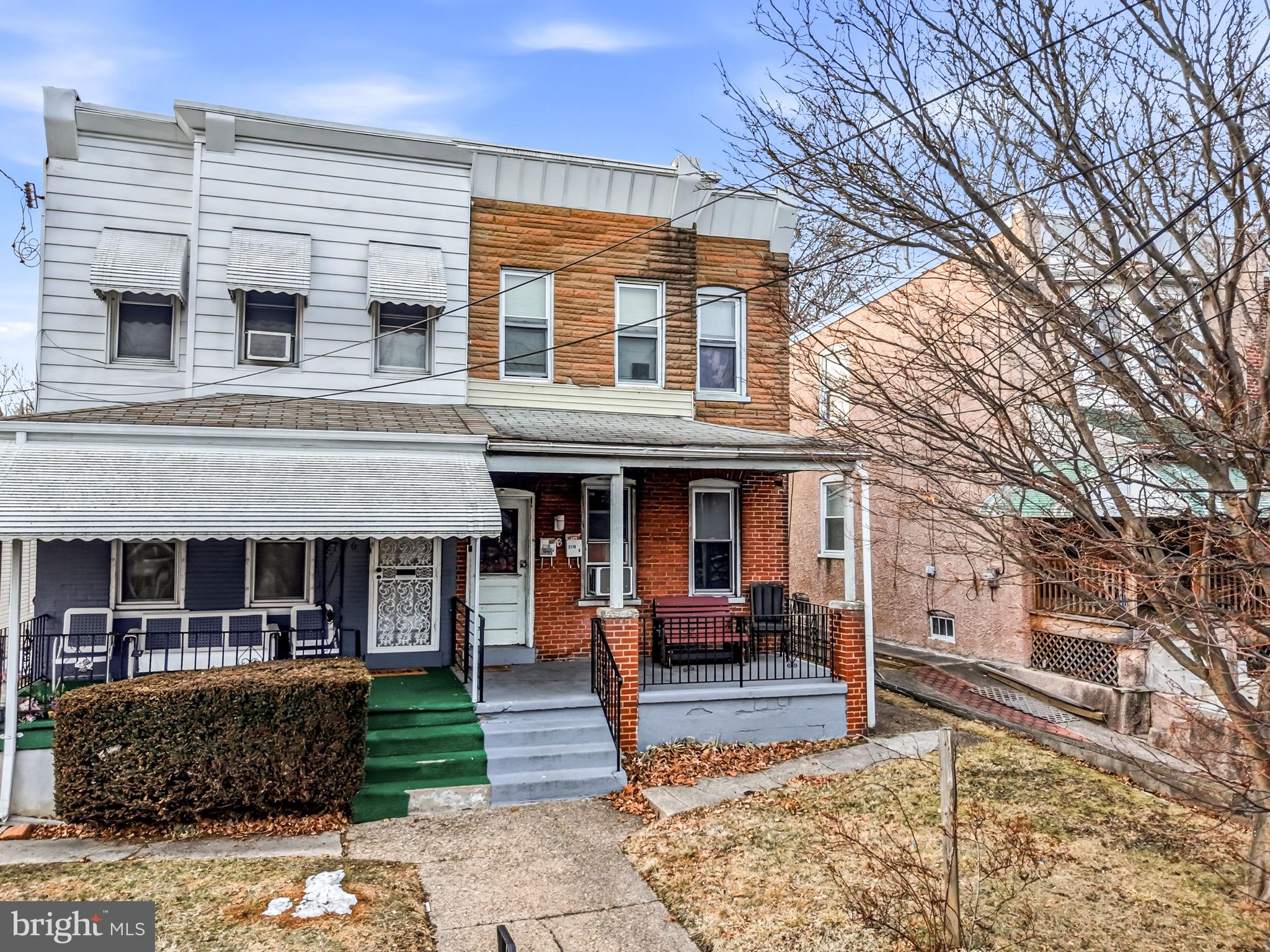2118 West 9th Street Chester, PA 19013 - Photo 1 of 3 a view of a house with a large window and wooden fence