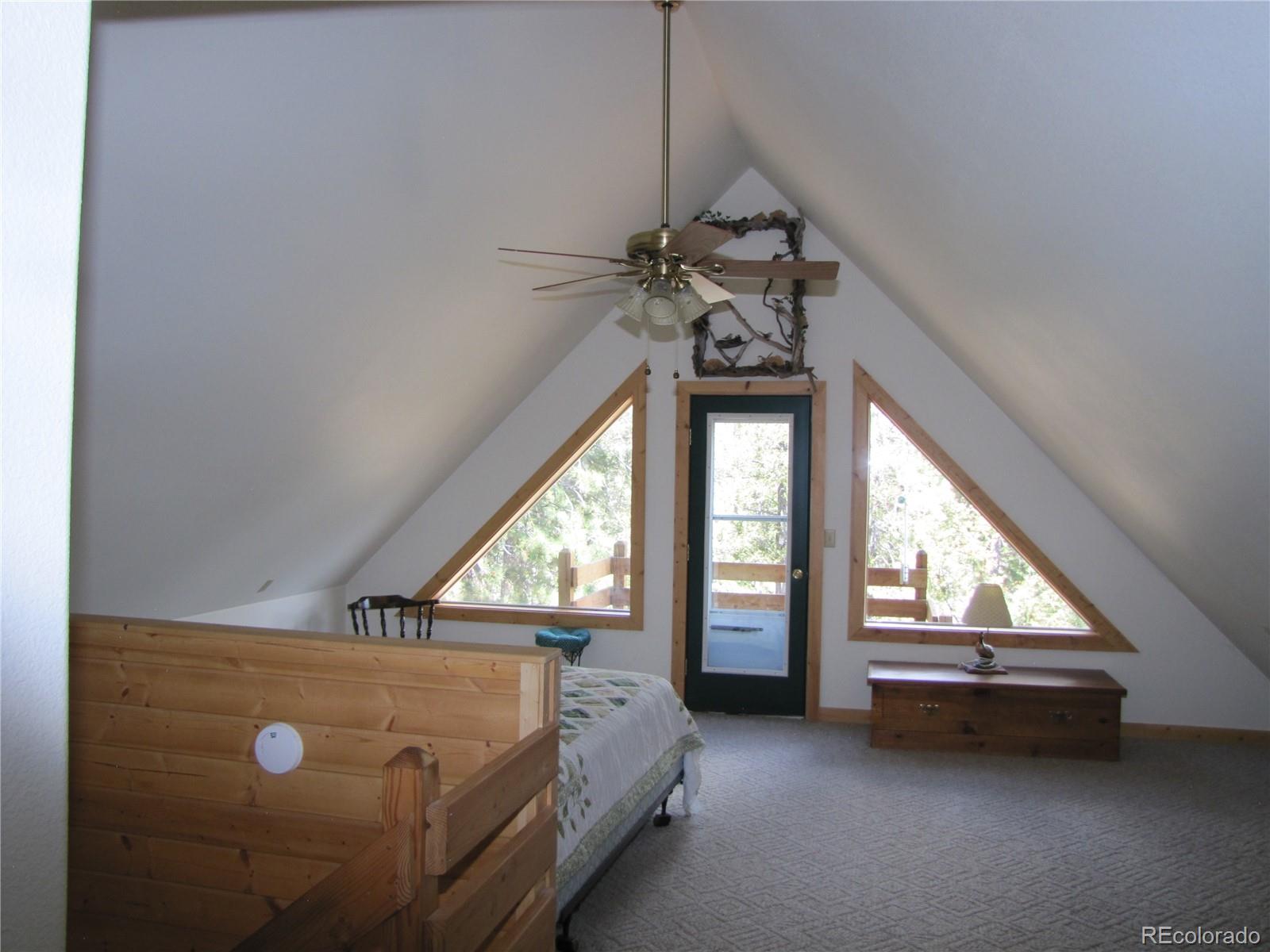 1240 Campfire Road Hartsel, CO 80449 - Photo 16 of 25 a very nice looking room with a large window