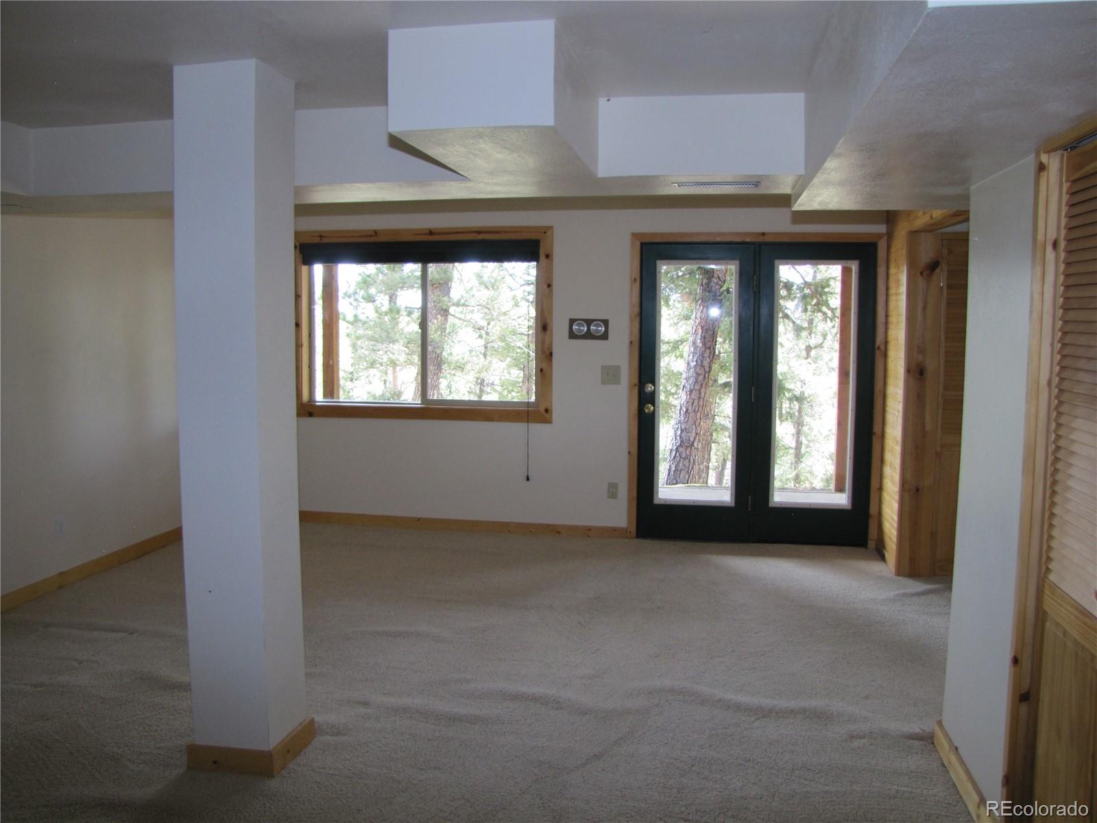 1240 Campfire Road Hartsel, CO 80449 - Photo 17 of 25 a view of a room that has a large window