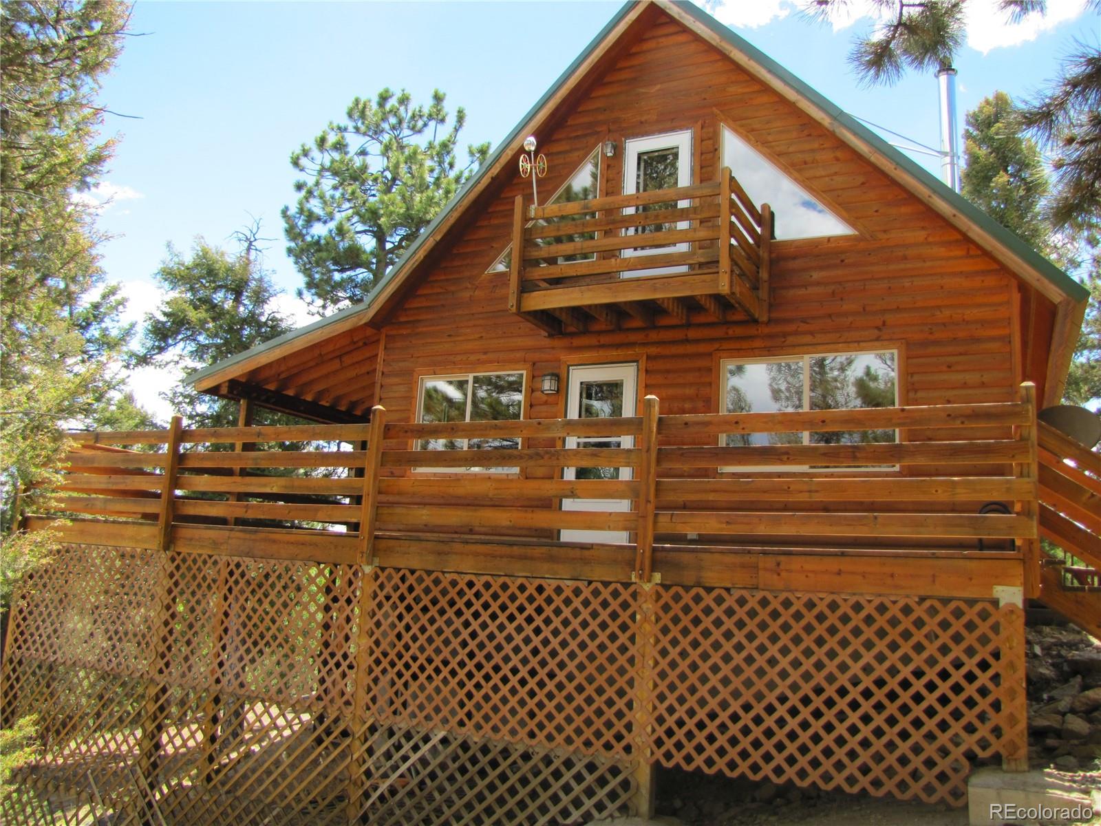1240 Campfire Road Hartsel, CO 80449 - Photo 23 of 25 a view of a house with a large window