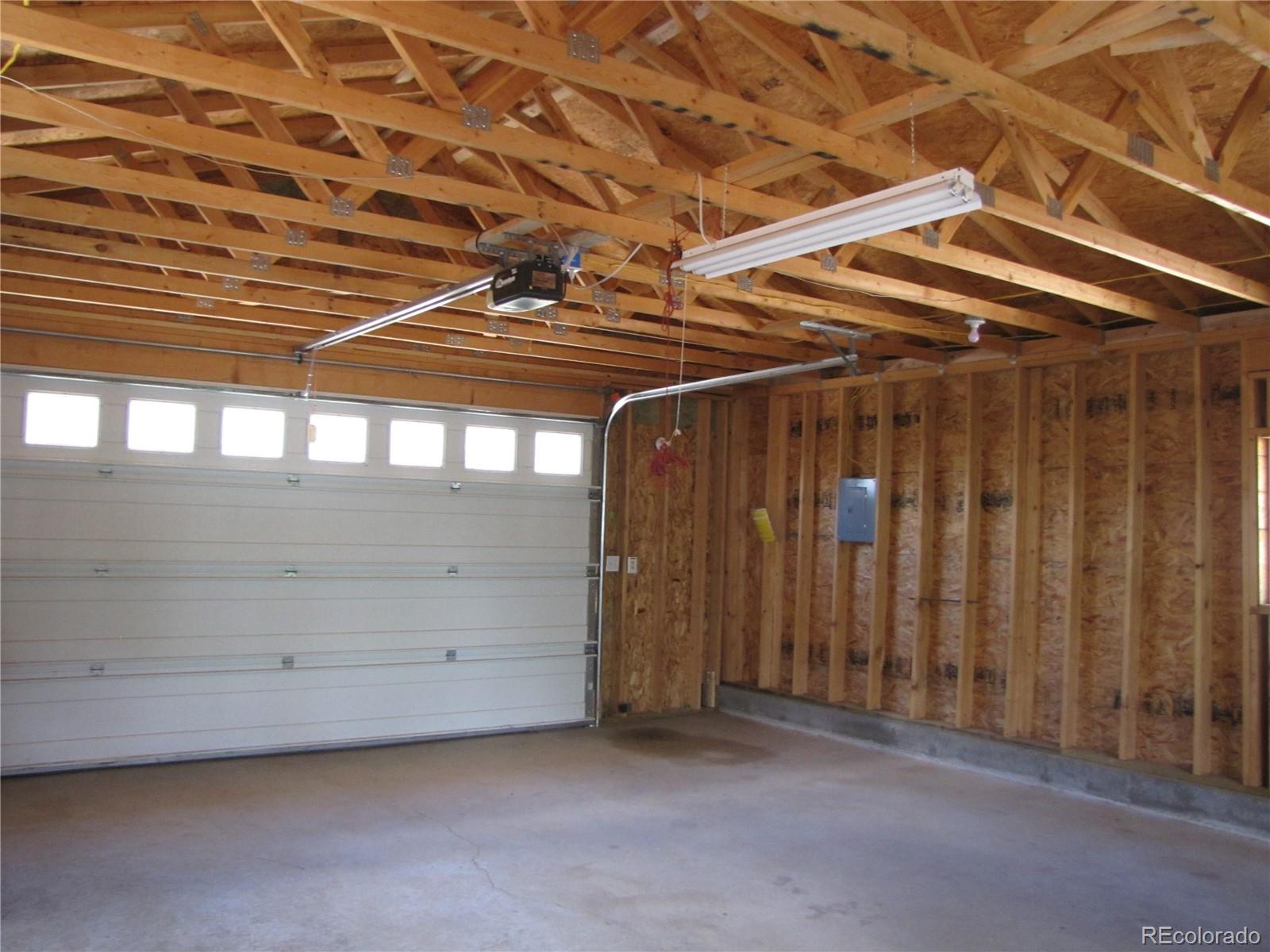 1240 Campfire Road Hartsel, CO 80449 - Photo 5 of 25 a view of a room with wooden walls