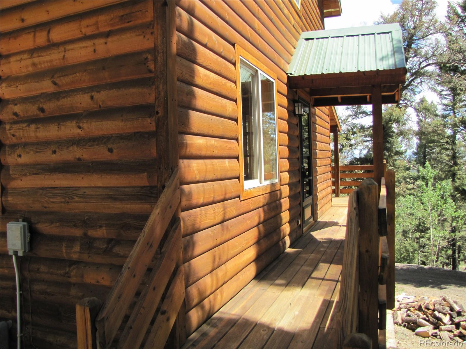 1240 Campfire Road Hartsel, CO 80449 - Photo 7 of 25 a view of entryway with a front door