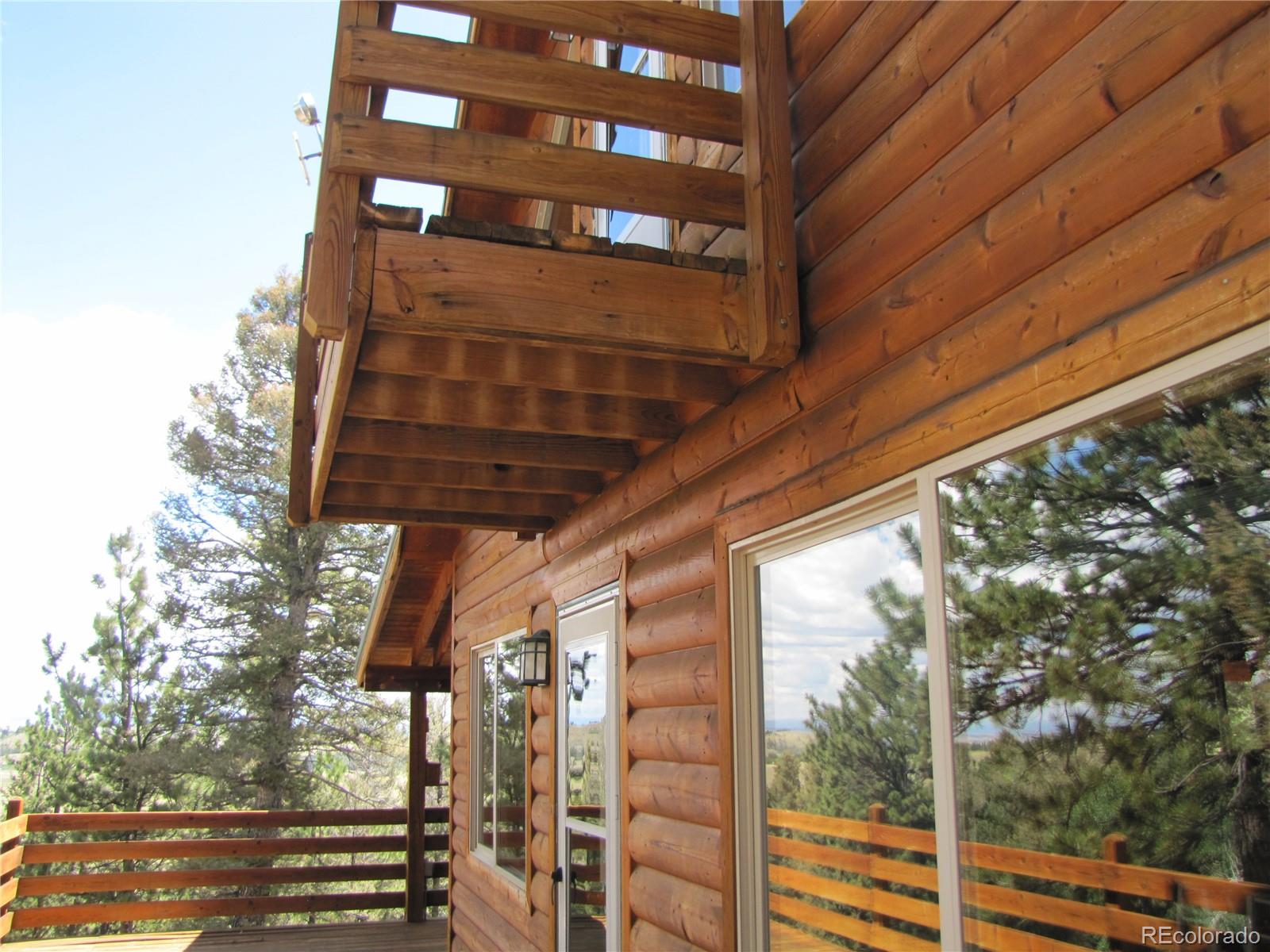 1240 Campfire Road Hartsel, CO 80449 - Photo 9 of 25 a view of a building from a window