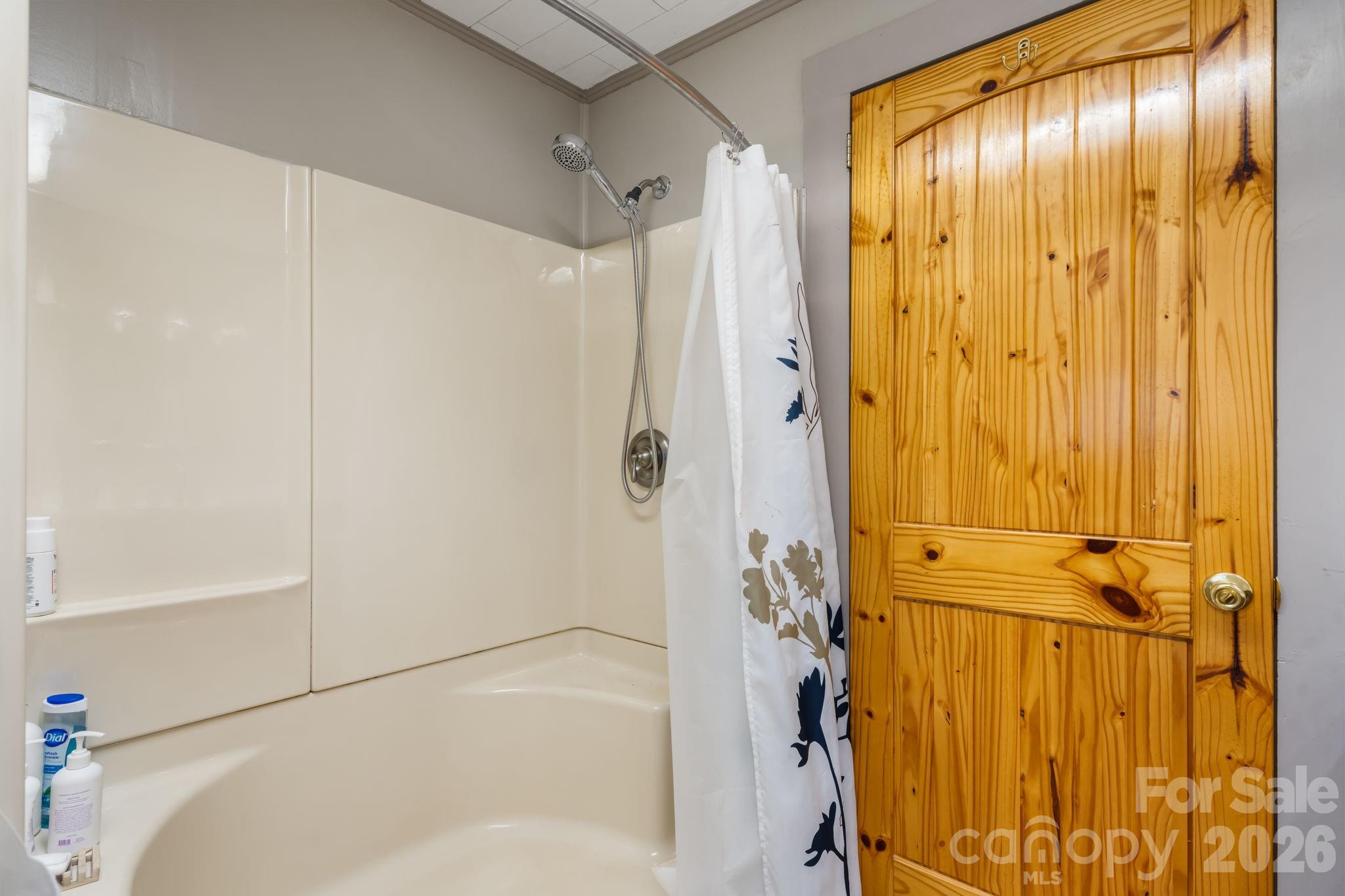2582 Startown Road Newton, NC 28658 - Photo 15 of 42 a bathroom with a bathtub and shower