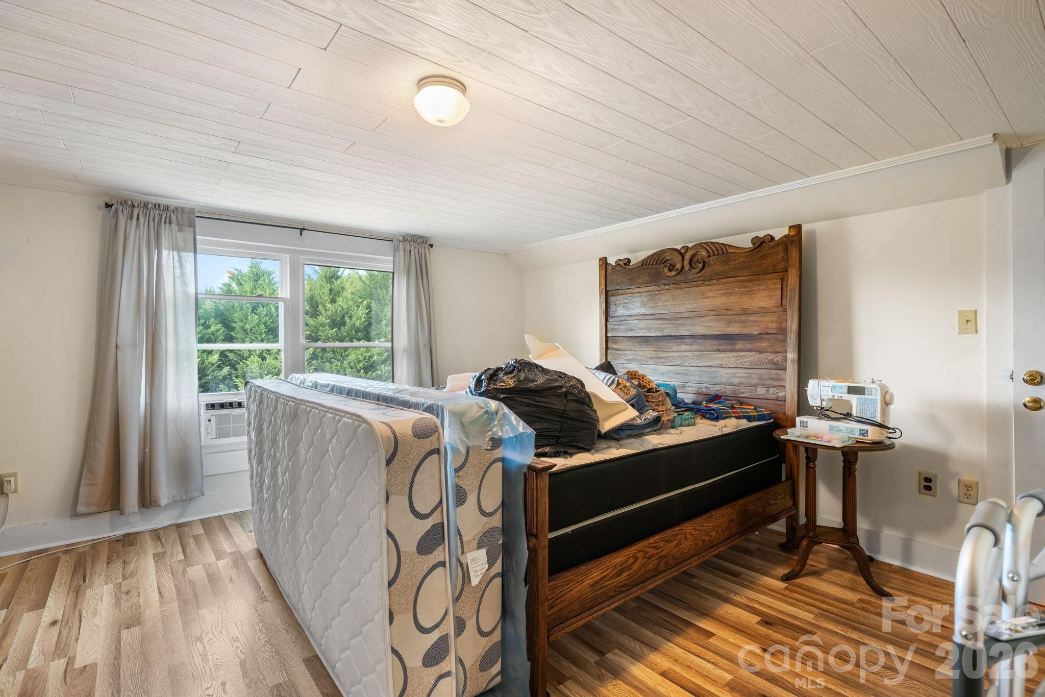 2582 Startown Road Newton, NC 28658 - Photo 18 of 42 a bed room with furniture and a window