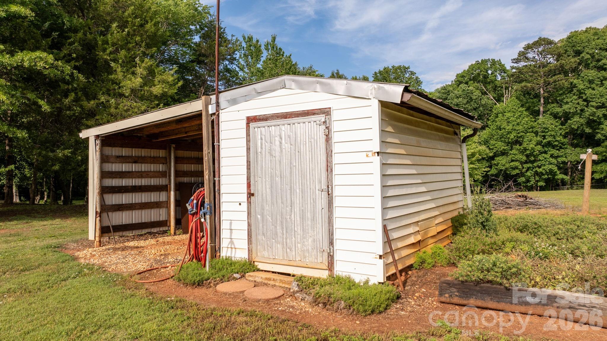 2582 Startown Road Newton, NC 28658 - Photo 28 of 42 a front view of a house with a yard