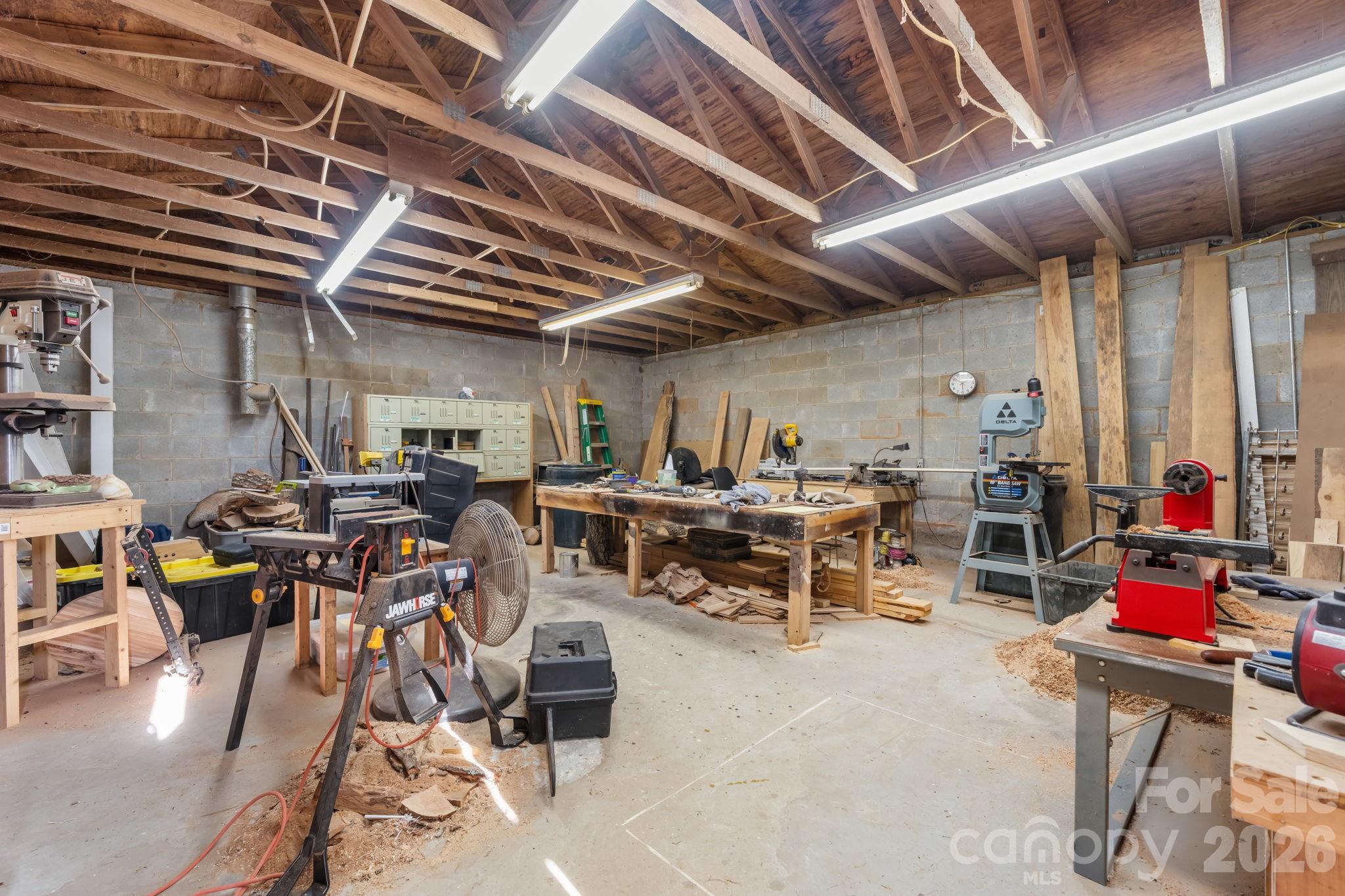 2582 Startown Road Newton, NC 28658 - Photo 38 of 42 a view of a room with gym equipment