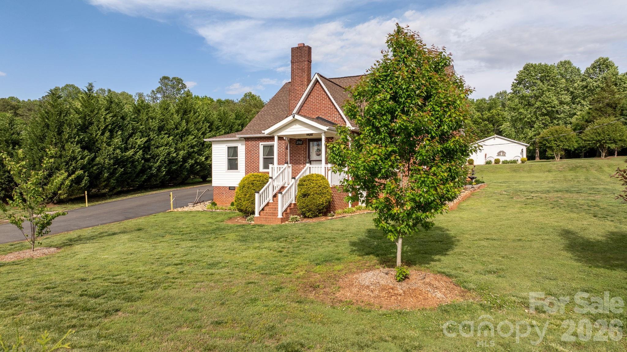 2582 Startown Road Newton, NC 28658 - Photo 39 of 42 a view of a house with a yard