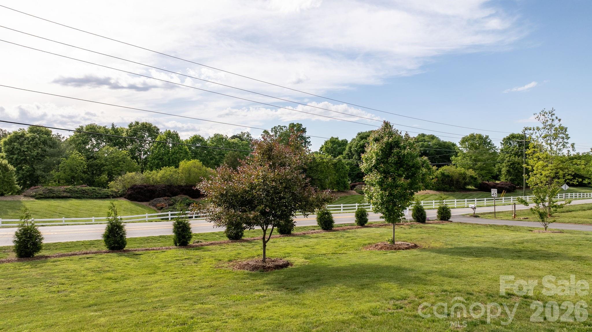 2582 Startown Road Newton, NC 28658 - Photo 40 of 42 a swimming pool with lots of tress in front of it