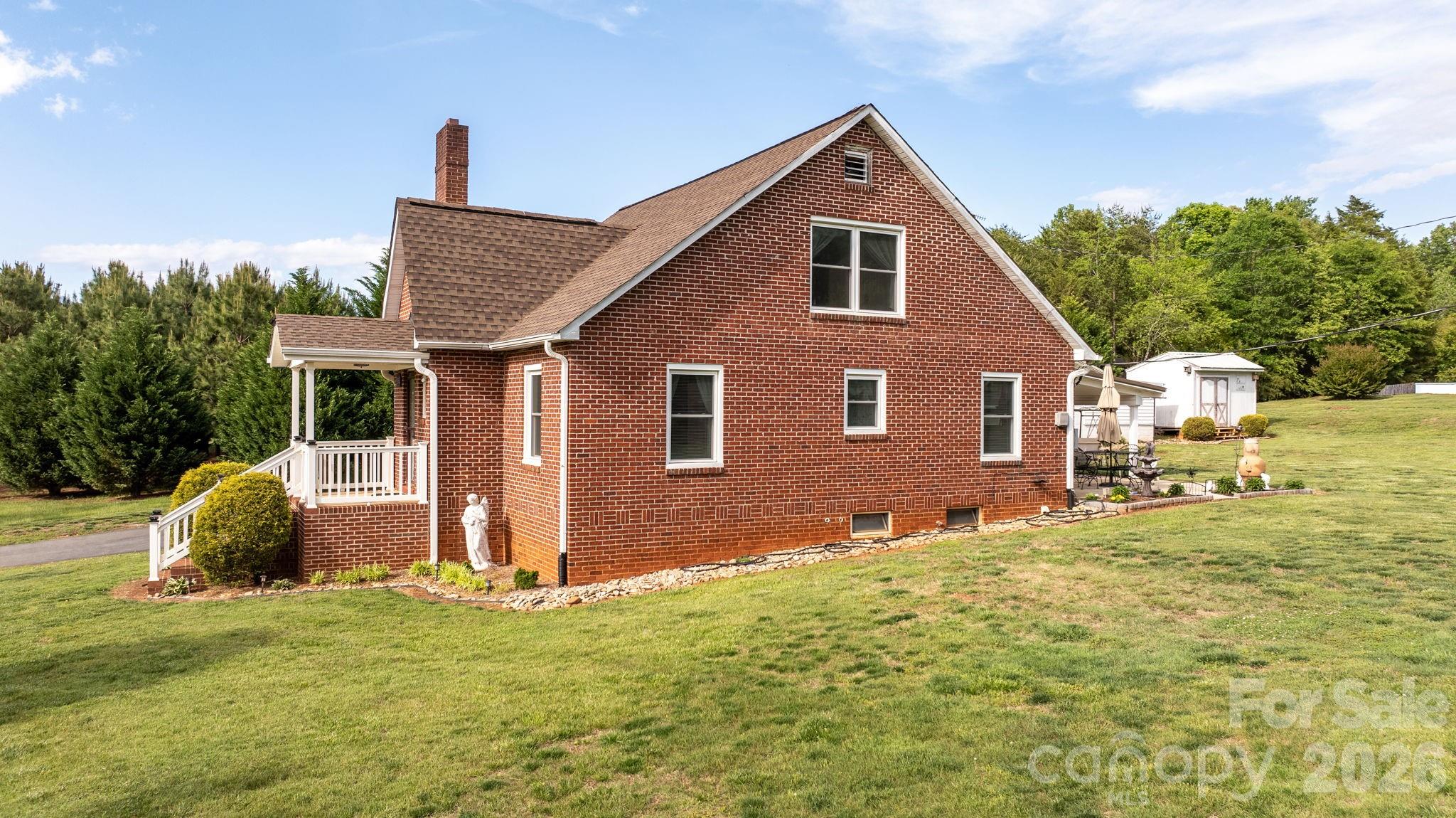 2582 Startown Road Newton, NC 28658 - Photo 41 of 42 front view of a house with a yard