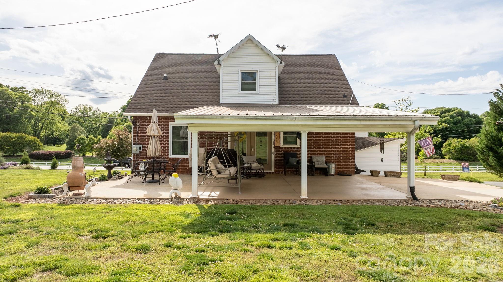 2582 Startown Road Newton, NC 28658 - Photo 42 of 42 a front view of house with yard and outdoor seating