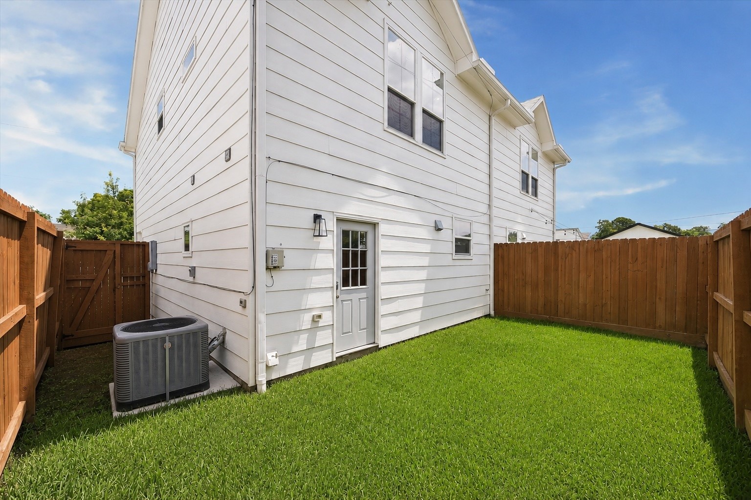 2749 Redrock Street, Unit B Houston, TX 77088 - Photo 22 of 24 Included is a sideyard with gated access to the front of the home.