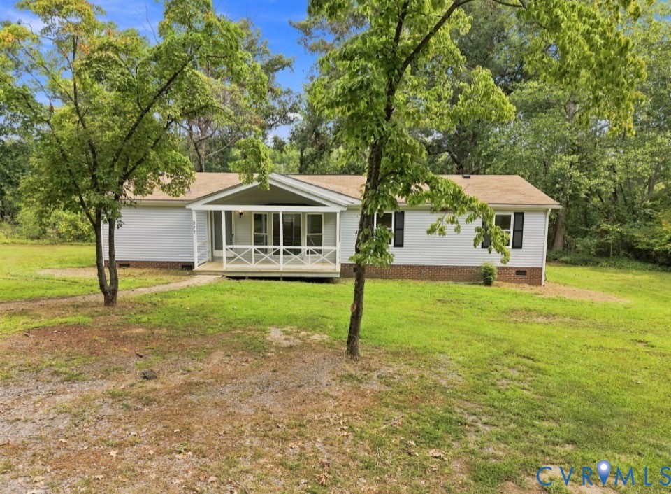 977 Burchs Mill Road Urbanna, VA 23175 - Photo 2 of 38 Single-story residence featuring white siding, a c