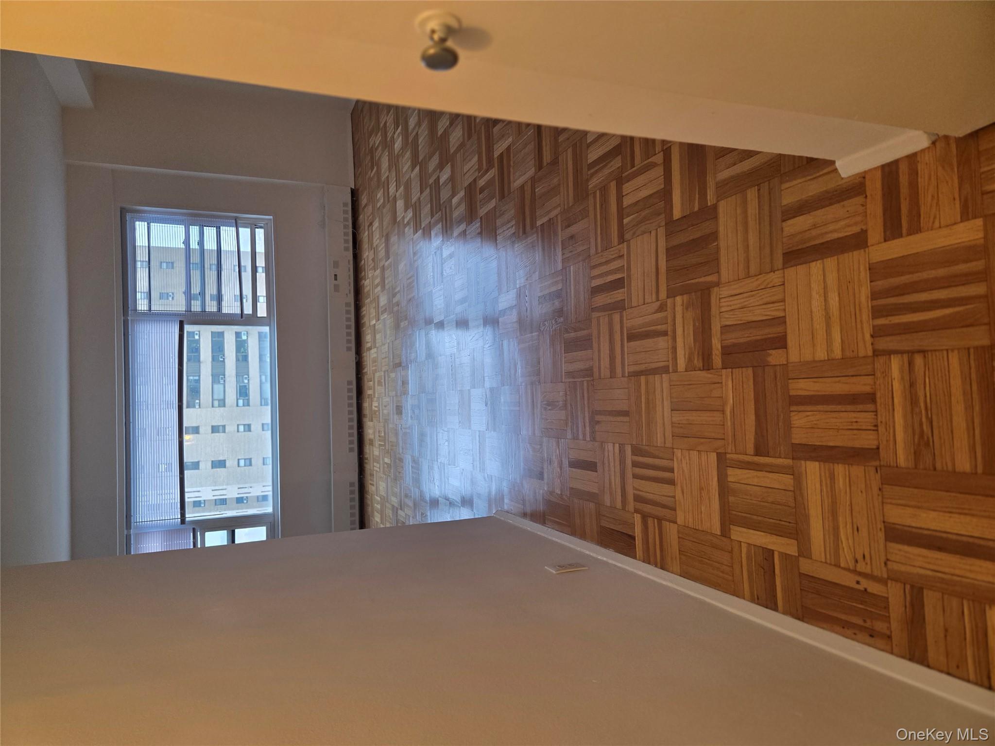 7 Fordham Hill Ovl, Unit 12G Bronx, NY 10468 - Photo 2 of 18 a view of wooden floor