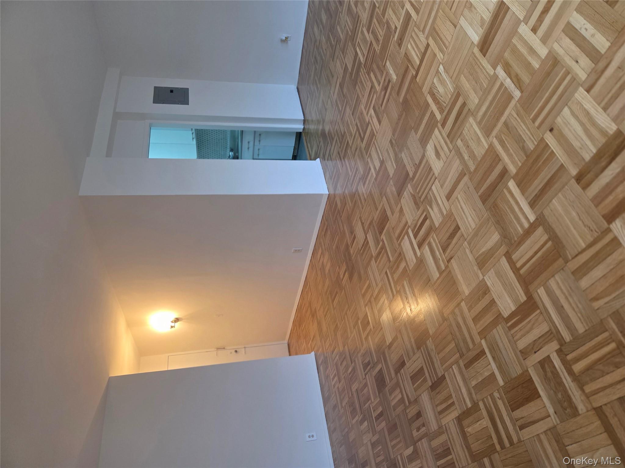 7 Fordham Hill Ovl, Unit 12G Bronx, NY 10468 - Photo 3 of 18 a view of an empty room and window