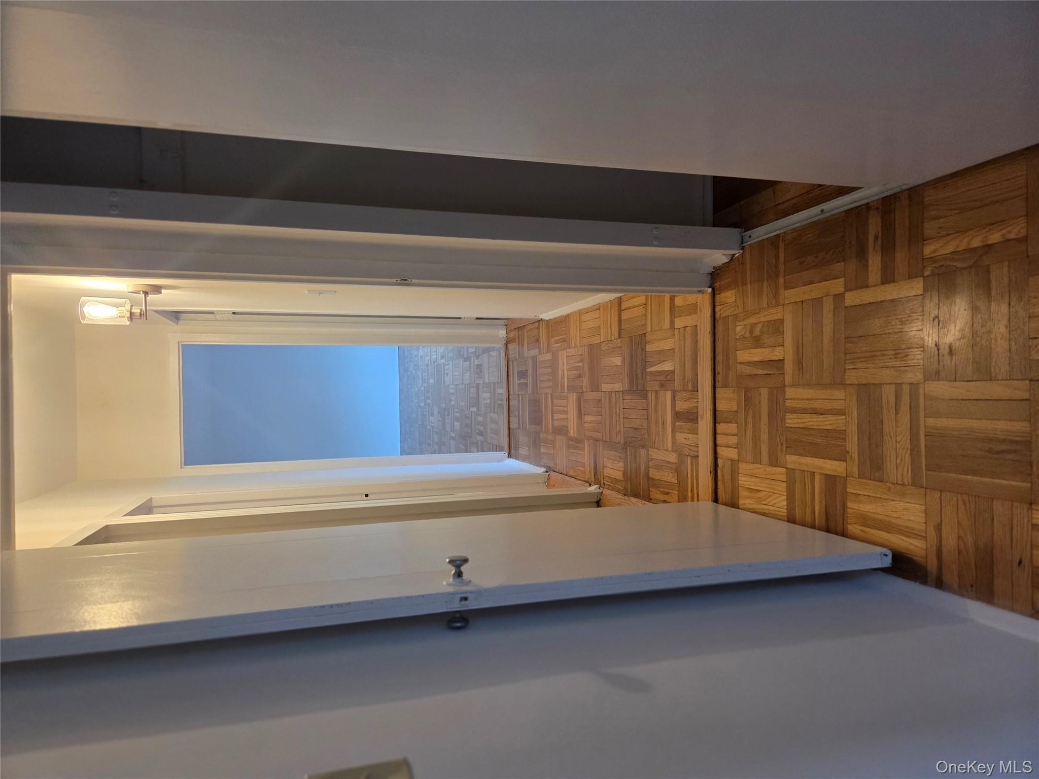 7 Fordham Hill Ovl, Unit 12G Bronx, NY 10468 - Photo 8 of 18 a view of hallway with staircase