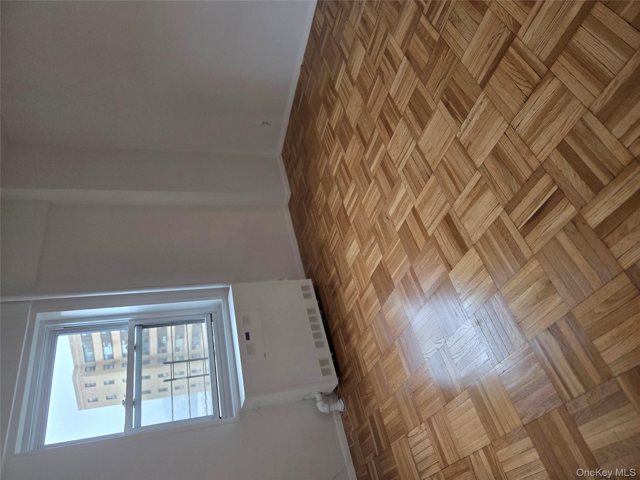 7 Fordham Hill Ovl, Unit 12G Bronx, NY 10468 - Photo 10 of 18 an empty room with a window