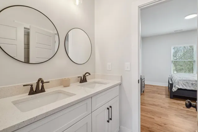 a bathroom with a sink and a mirror