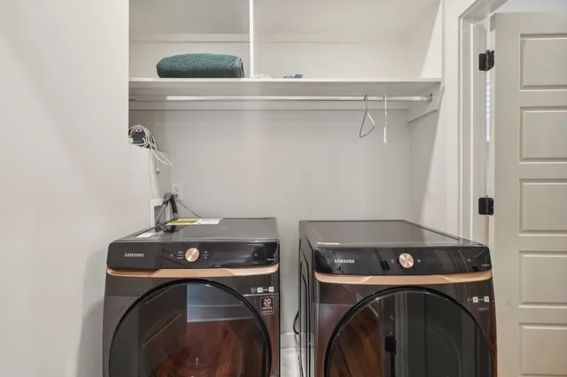 a utility room with dryer and washer