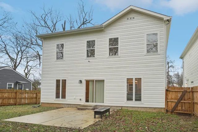 a front view of a house with a garage